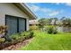 Charming home with a view of lush landscaping and a serene pond at 3362 Sandleheath # 12, Sarasota, FL 34235