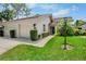 Charming single-story home with well-maintained landscaping and an attached two-car garage at 3362 Sandleheath # 12, Sarasota, FL 34235