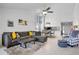 Open-concept living area with comfortable seating, modern décor, and inviting atmosphere at 3362 Sandleheath # 12, Sarasota, FL 34235