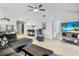 Inviting living space with tile flooring, comfortable seating, and modern entertainment setup at 3362 Sandleheath # 12, Sarasota, FL 34235