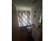 Cozy bathroom with a floral shower curtain, toilet, sink and vanity with mirror at 3622 N 51St St, Tampa, FL 33619