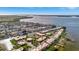 Wide aerial shot of a waterfront community with beautiful water views and private boat slips at 3876 Catalina Dr, Bradenton, FL 34210