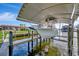 Exterior boat dock featuring a boat lift system, and waterfront access at 3876 Catalina Dr, Bradenton, FL 34210