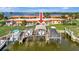 Lovely wide angle shot of boat docks attached to the property, ready for water adventures at 3876 Catalina Dr, Bradenton, FL 34210