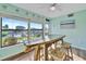 Charming dining area with waterfront views and coastal-inspired decor at 3876 Catalina Dr, Bradenton, FL 34210