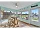 Bright dining area with ample windows, and casual beachside decor at 3876 Catalina Dr, Bradenton, FL 34210