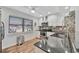 Modern kitchen with stainless steel appliances, granite countertops, and mosaic backsplash at 3876 Catalina Dr, Bradenton, FL 34210