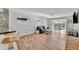 Bright living room with coastal decor, wood floors, and comfortable seating at 3876 Catalina Dr, Bradenton, FL 34210