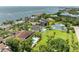 Waterfront property offering stunning ocean views, a private pool, and beautifully landscaped grounds at 3903 Bayside Dr, Bradenton, FL 34210