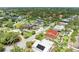 Charming home in a quiet neighborhood with lush greenery and mature trees surrounding the property at 3903 Bayside Dr, Bradenton, FL 34210