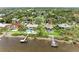 Beautiful waterfront home with lush landscaping, private dock, and easy access to the bay at 3903 Bayside Dr, Bradenton, FL 34210