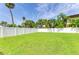 Large, grass-covered backyard surrounded by a tall privacy fence at 3903 Bayside Dr, Bradenton, FL 34210