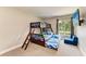 bedroom featuring bunk beds and entertainment center at 3903 Bayside Dr, Bradenton, FL 34210
