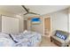 Comfortable bedroom with ceiling fan and en suite bathroom at 3903 Bayside Dr, Bradenton, FL 34210