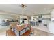 Open-concept kitchen, featuring an island, modern appliances, and a view into the living room at 3903 Bayside Dr, Bradenton, FL 34210