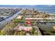 Waterfront homes with boat docks and canals provide direct access to bay in this aerial community view at 4096 El Dorado Cv, Bradenton, FL 34210