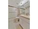 Bathroom with white vanity, shower with glass doors and neutral paint at 4096 El Dorado Cv, Bradenton, FL 34210