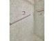 Close up of the tiled shower showcasing the fixtures and design at 4096 El Dorado Cv, Bradenton, FL 34210