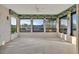 Bright, open sunroom with ample natural light and scenic waterfront views at 4096 El Dorado Cv, Bradenton, FL 34210