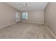Spacious bedroom with ample natural light, neutral walls, and carpet flooring at 4153 Fairway Dr, North Port, FL 34287