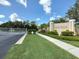 Gated entrance to 'Villas of Sabal Trace', featuring pristine landscaping and a secure environment at 4153 Fairway Dr, North Port, FL 34287