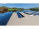 Experience easy water access with a modern dock, ideal for boating and relaxing at 4153 Fairway Dr, North Port, FL 34287
