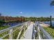Access the waterway via the convenient dock and walkway, perfect for outdoor enthusiasts at 4153 Fairway Dr, North Port, FL 34287