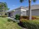 A well-maintained single-story home with manicured landscaping at 4153 Fairway Dr, North Port, FL 34287