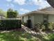 Charming single-story home with manicured landscaping and a walkway leading to the entrance at 4176 Center Pointe Cir # 70A, Sarasota, FL 34233
