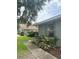 A cozy home with a well-maintained yard and a paved walkway leading to the entrance at 4176 Center Pointe Cir # 70A, Sarasota, FL 34233