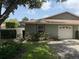 Charming home with a single-car garage and a well-manicured lawn with established landscaping at 4176 Center Pointe Cir # 70A, Sarasota, FL 34233