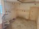 A view of a kitchen with some demolition at 4176 Center Pointe Cir # 70A, Sarasota, FL 34233