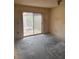 A bright room featuring a sliding glass door for natural light at 4176 Center Pointe Cir # 70A, Sarasota, FL 34233