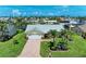 Aerial view of this property, boasting great curb appeal with a waterfront location at 4508 Mangrove Point Rd, Bradenton, FL 34210