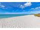 Daytime shot of a white sandy beach at 4508 Mangrove Point Rd, Bradenton, FL 34210