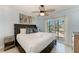 Relaxing bedroom with large sliding doors that provide lots of natural light at 4508 Mangrove Point Rd, Bradenton, FL 34210