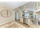 Kitchen with stainless steel appliances and a granite counter, as well as a breakfast bar at 4508 Mangrove Point Rd, Bradenton, FL 34210