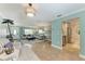 Inviting living room with tile floors, neutral furniture, and stylish coastal accents at 4508 Mangrove Point Rd, Bradenton, FL 34210