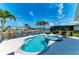 Beautiful pool and hot tub with waterfront views and lush landscaping at 4508 Mangrove Point Rd, Bradenton, FL 34210