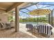 Relaxing screened-in lanai with refreshing pool and comfortable outdoor seating area at 4524 Baltry Ct, Bradenton, FL 34211