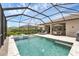 Inviting screened-in pool with sun loungers, outdoor dining, and serene backyard views at 4524 Baltry Ct, Bradenton, FL 34211