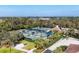 A full aerial view of the tennis courts showcases the multiple well-maintained courts and a covered gazebo at 4524 Baltry Ct, Bradenton, FL 34211