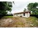 Spacious backyard with minimal grass and a black-fenced perimeter at 4616 34Th E Ave, Bradenton, FL 34208