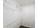 A walk-in closet with white walls and wire shelves for storage at 4616 34Th E Ave, Bradenton, FL 34208