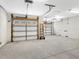 Spacious garage with two doors, offering ample storage and parking space for vehicles and equipment at 4830 Estrada De Costa, Sarasota, FL 34242