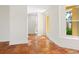 Bright hallway with terracotta floors and natural light at 4830 Estrada De Costa, Sarasota, FL 34242