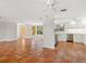 Open-concept kitchen featuring tile flooring, stainless steel appliances, and plenty of natural light at 4830 Estrada De Costa, Sarasota, FL 34242