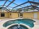 Backyard pool with screened enclosure at 4830 Estrada De Costa, Sarasota, FL 34242