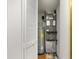 Utility closet with water heater and HVAC system at 4830 Estrada De Costa, Sarasota, FL 34242