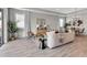 Bright and airy living room with neutral decor, dining area, and plenty of natural light at 4869 Antrim Dr, Sarasota, FL 34240